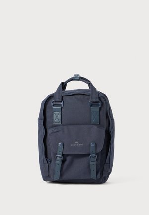 Navy blue backpack made from durable fabric, featuring adjustable straps, front pocket with flap, and leather accents. Minimalist design elements.