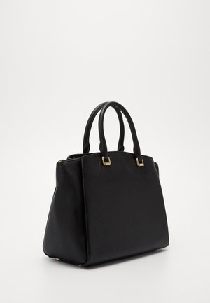 Sac à main en cuir noir au design structuré, avec deux anses supérieures, des accents en matériel doré et une surface texturée.