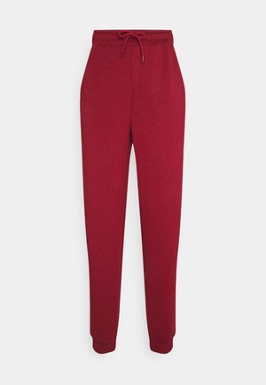 Rode katoenen joggingbroek met elastische tailleband en trekkoord, taps toelopende pijpen en geribde boorden.