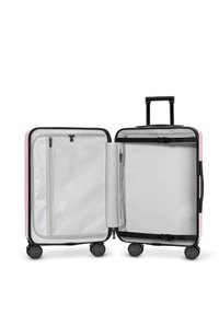 Hartschalenkoffer in zartem Rosa mit schwarzen Akzenten, ausgestattet mit einem Reißverschlussfach und einem Organisationspanel, vier Rollen und einem ausziehbaren Griff.