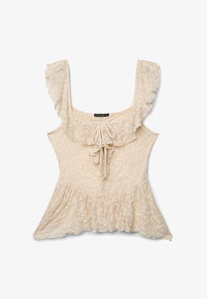 Top senza maniche color beige in pizzo con spalline arricciate, scollo quadrato, dettaglio con fiocco sul davanti e orlo a peplum.