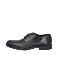 Zapato de vestir de cuero negro con puntera redondeada, diseño con cordones, textura suave y estética minimalista. Suela de goma con un pequeño tacón.