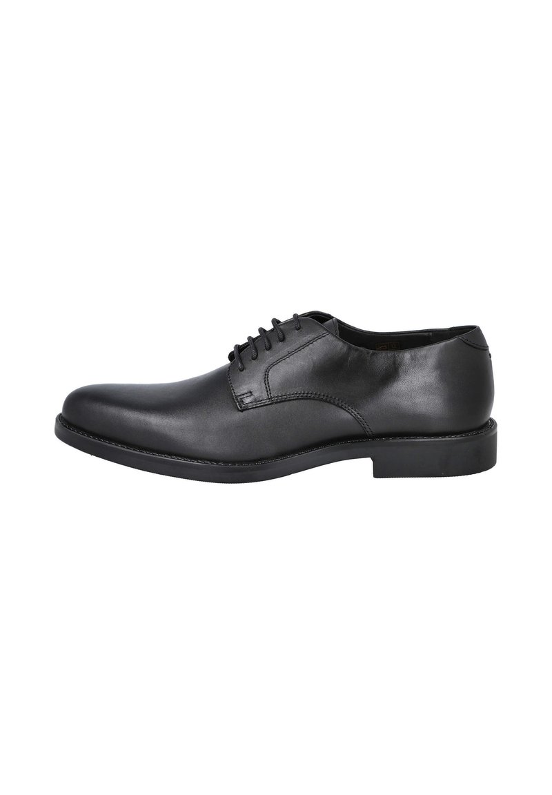 Zapato de vestir de cuero negro con puntera redondeada, diseño con cordones, textura suave y estética minimalista. Suela de goma con un pequeño tacón.