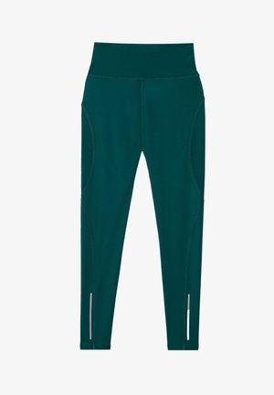 Colanți teal cu talie înaltă, fabricați dintr-un material neted și elastic. Prezintă accente reflective și detalii cu cusături curbe.