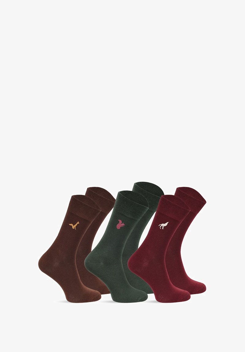 Cztery pary skarpetek w kolorach brązowym, zielonym i burgundowym. Każda para ma mały emblemat zwierzęcia wyszyty w kontrastowych kolorach. Miękka tekstura.