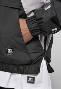 Starter Tuulejope - black/silvergrey/white