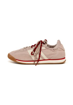 Light pink suede sneaker with white stripes, red and black laces, and a brown rubber sole with red and white midsole stripes.