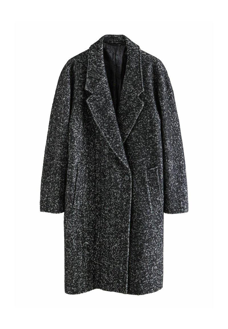 Manteau en mélange de laine noir et blanc à motifs épars, avec un large col, deux poches avant et une fermeture à double bouton.
