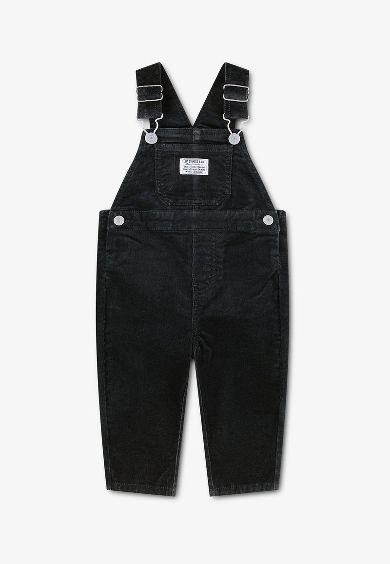 Salopette en denim noir pour tout-petits avec bretelles réglables et poche avant portant une étiquette Levi Strauss & Co.