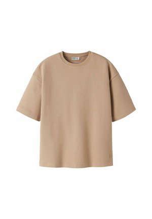 T-shirt beige manches courtes en maille côtelée avec un col rond et des épaules tombantes, posé à plat sur un fond blanc.