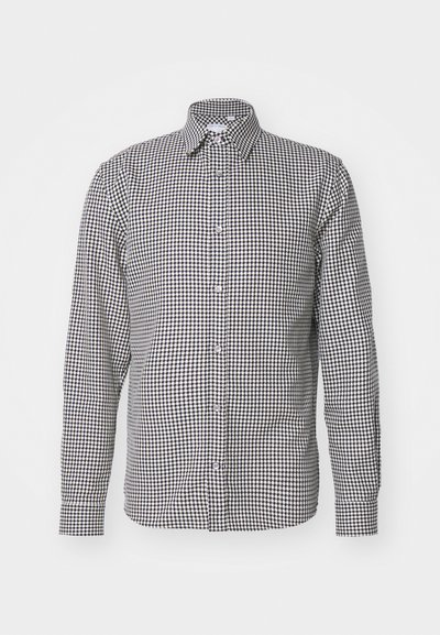 Black and white checkered shirt, buttoned with a collar, long sleeves, featuring a grid pattern and smooth fabric texture.