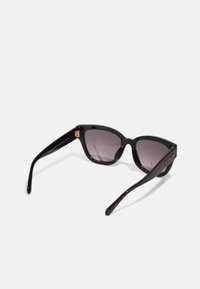COACH Sunglasses - ruby pearl