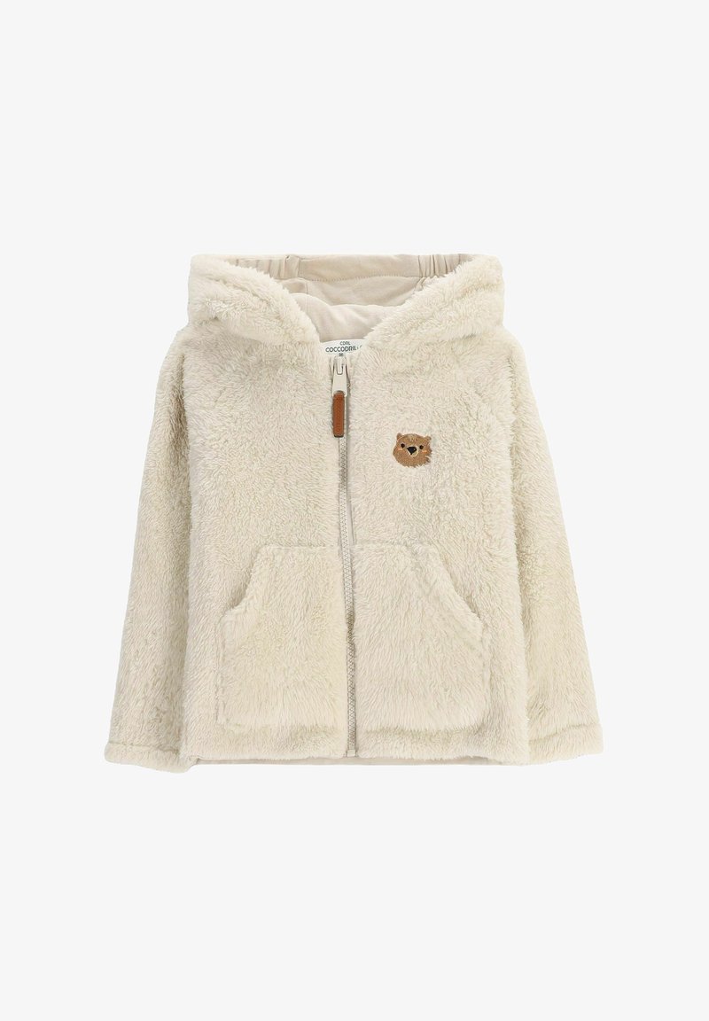 Kremowy polarowy hoodie z zamkiem błyskawicznym z przodu, dwoma przednimi kieszeniami oraz haftem przedstawiającym twarz niedźwiedzia na lewej piersi. Miękki, fakturowany materiał.