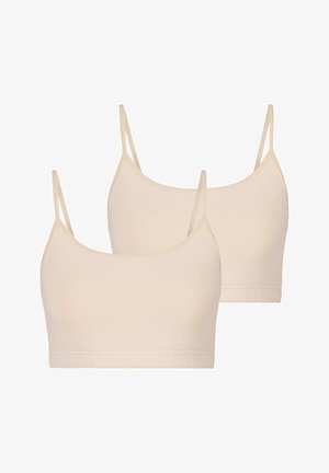 Soutien-gorge débardeur beige avec bretelles réglables, tissu doux et design sans couture. Comprend deux pièces. Encolure ronde classique, sans embellissements.
