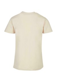 Kortærmet, cremefarvet t-shirt lavet af bomuld. Har en klassisk rund hals og en simpel, glat tekstur uden synlige mønstre.