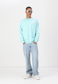 Marimekko LOISTO UNIKKO UNISEX - Melegítőfelső - turquoise