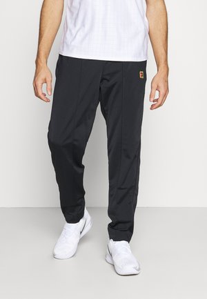 Nike Performance HERITAGE SUIT PANT - Pantalon de survêtement - black