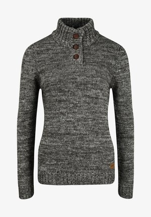 Pull en tricot dans des nuances de gris foncé et noir, avec un col haut, trois boutons marron et un motif texturé. Détail de l'étiquette sur le côté visible.