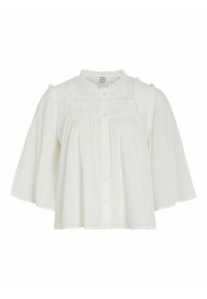 Blouse blanche avec un col arrondi, des manches courtes à volants, fermeture à bouton sur le devant et des détails plissés sur le corsage. Tissu doux et léger.