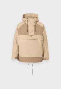 Veste à capuche beige avec un zip mi-long à l'avant, grande poche avant et cordons de serrage réglables à l'ourlet et à la capuche. Présente des panneaux contrastés.