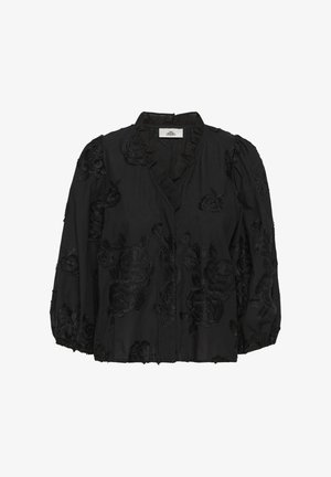 Must musta pika varrukaga pluus, millel on puhvis varrukad, volditud kaelus ja üle kogu pluusi musta lillemustriga tikandid.