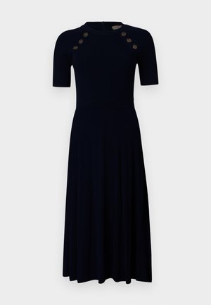 Gestreiftes navyblaues Kleid mit kurzen Ärmeln, tailliertem Oberteil, schwingendem Rock und sechs goldenen Knopfakzenten an den Schultern. Reißverschlussverschluss hinten.