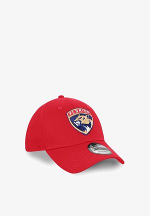 Red baseball cap with a curved bill, featuring an embroidered Florida Panthers logo in gold, blue, and cream on the front panel.