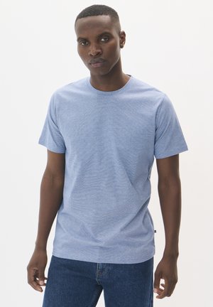 Light blue, short-sleeve t-shirt made from a textured fabric. Features a round neckline and a fitted design, with a small logo detail at the hem.