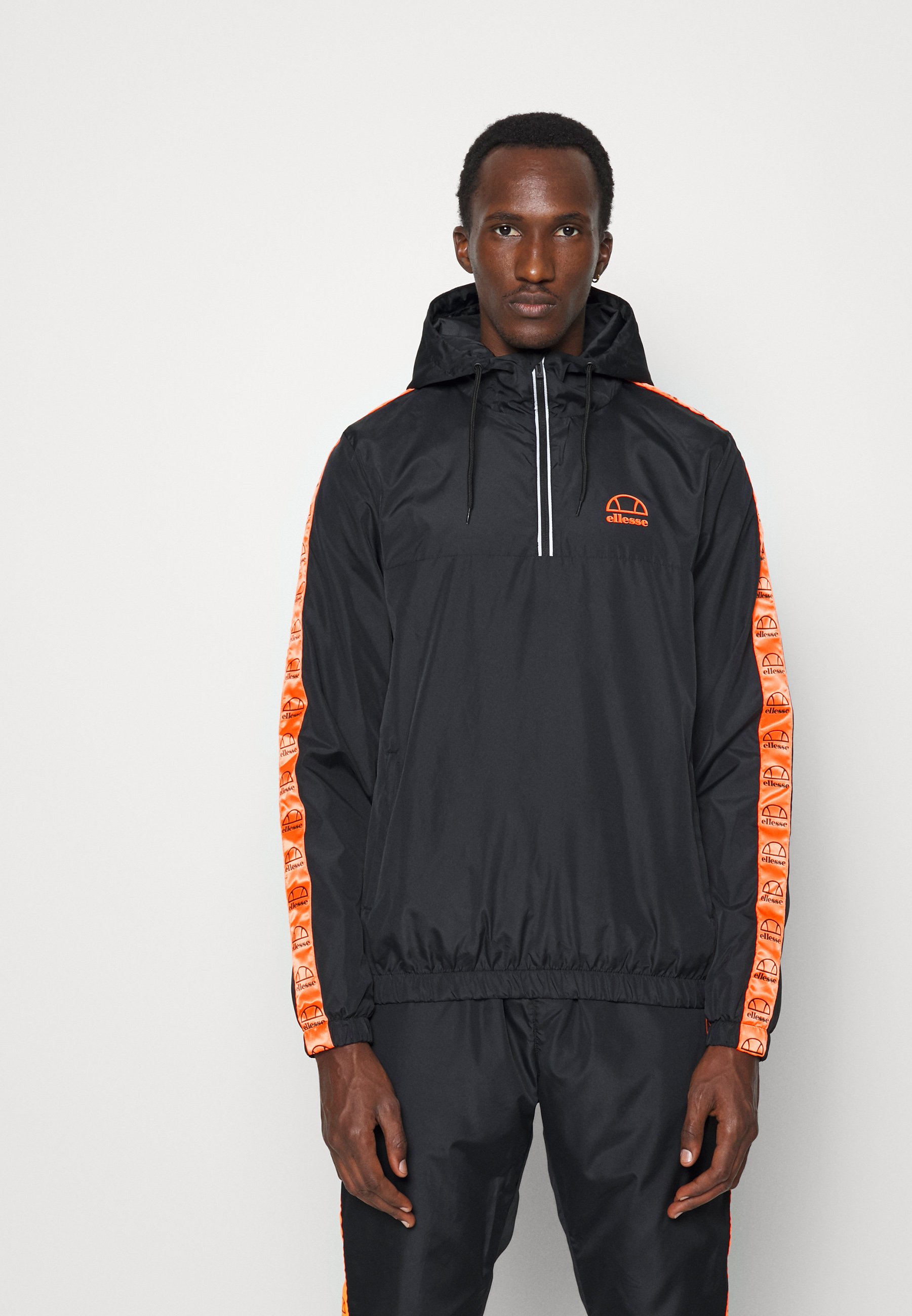 ellesse black tracksuit