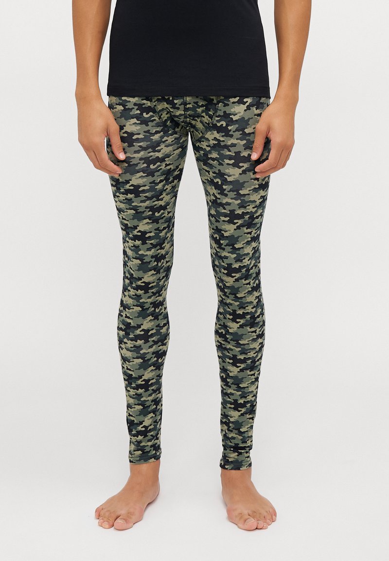 Camo leggings in shades of green and black, featuring a fitted design and smooth texture. No visible logos or embellishments.