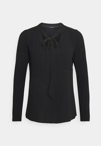 Svart blus med lång ärm och knytkrage, tillverkad av mjukt tyg och med en enkel, skräddarsydd design. Inkluderar två små framfickor.