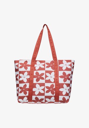 Tote bag met een roestkleurig en wit ruitjesbloemenpatroon, met lange roestkleurige handvatten waarop de merknaam "ROXY" is ingebosd.