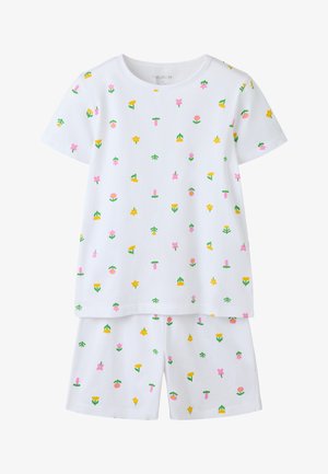 White short-sleeve shirt and shorts set with small pink, yellow, and green floral patterns scattered evenly across fabric.