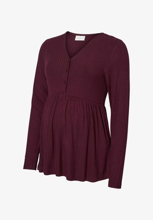Bordeaux lange mouw top met een geribbelde textuur, V-hals en knoopdetail op de borst, met een gathered taille voor een ontspannen pasvorm.