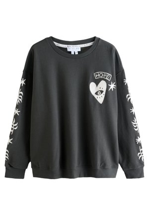 Black crewneck sweatshirt with white heart and eye graphic labeled "HOPE" on chest, and white star and abstract designs down both sleeves.