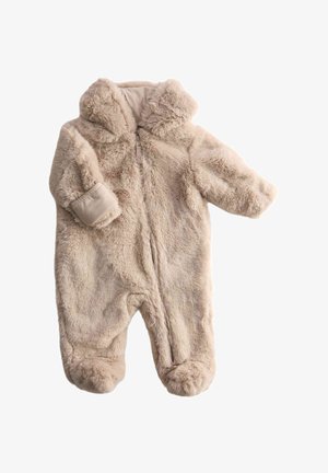 Fleece baby jumpsuit in lichtbeige, met een rits aan de voorkant, een capuchon en voetjes. Zachte textuur met een pluizige buitenkant en omgeslagen mouwen.