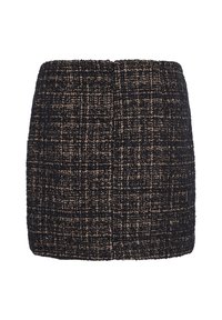 Svart och beige tweed mini kjol med en strukturerad mönster, med en rak silhuett och en kant som sitter ovanför knäet.