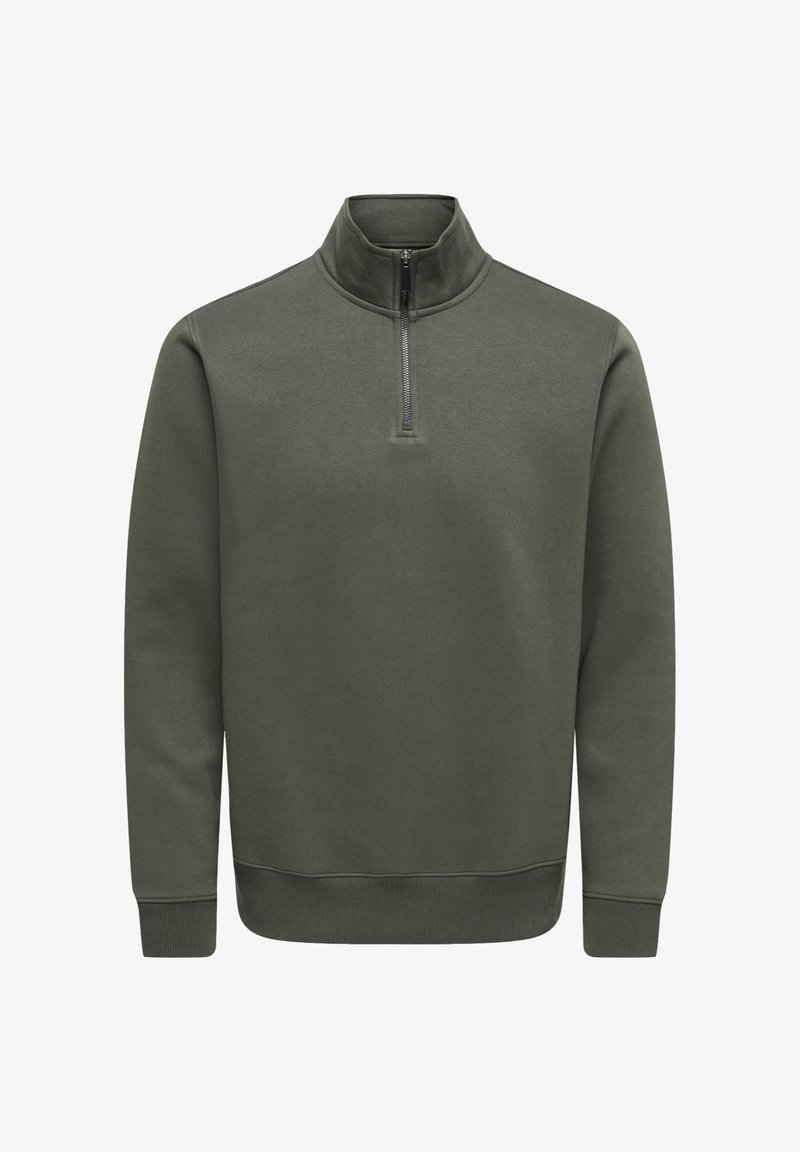 Pull-over à manches longues de couleur vert olive avec une demi-fermeture éclair à l'avant et des poignets et ourlet côtelés.