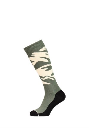 Groene kniekous met zwarte hiel en teen, met een wit en donkergroen camouflagepatroon op het been.