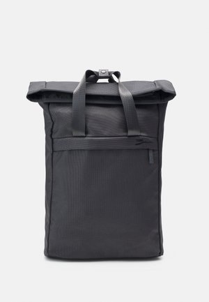 Black rectangular roll-top backpack with two handles and a snap fastener on a plain background.
