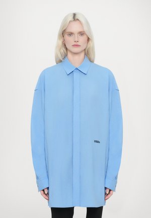 PLEASE STEAM OVERSIZED SHIRT - Button-down blouse - light blue