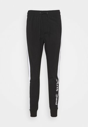 JOGGERS - Tracksuit bottoms - black