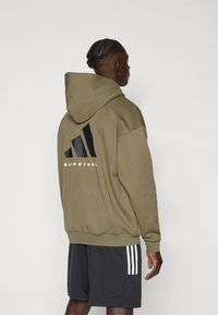 adidas Performance Majica s kapuljačom - olive strata