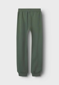 Grüne Sweatpants aus weichem Material mit flexiblem Bund, schmal zulaufenden Bündchen und glatter Textur in schlichter Ausführung.