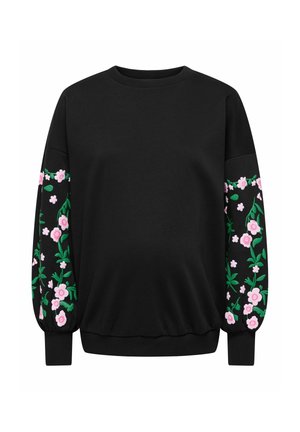 Sweat-shirt noir à manches longues avec motifs floraux roses et blancs et feuilles vertes sur les manches, avec poignets et ourlet côtelés.