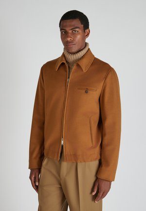 Brown wool jacket with a collared neckline, front zipper, and side pockets. Features a small chest pocket with a button detail.