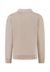 Beige sweatshirt met een klassieke kraag, lange mouwen, geribbelde manchetten en een gestructureerde afwerking. Naadloze achterkant voor een soepele silhouette.