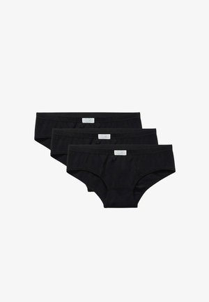Tre slip neri in cotone impilati orizzontalmente con piccole etichette rettangolari bianche con il marchio sulle cinture.
