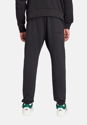 ALL SZN TRAINING - Tracksuit bottoms - schwarz