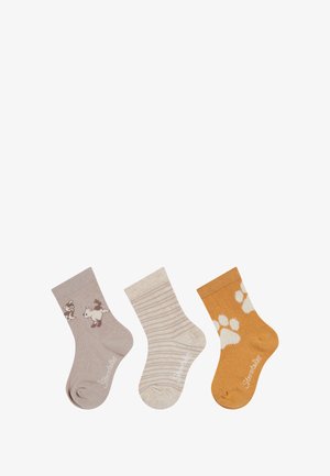 Drei Paar Socken: ein beige mit Tiermuster, ein hellgrau gestreift, ein senfgelb mit weißen Pfotenabdrücken, jeweils mit gerippten Bündchen.